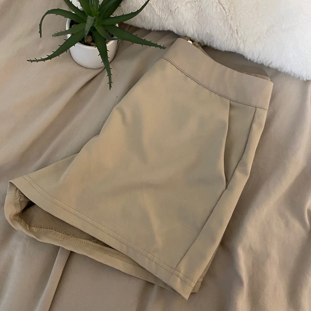 Beige or tan dress shorts! Brand new still has tag